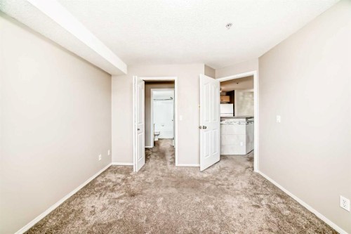 1220-10 Prestwick Bay Se, Calgary, AB - Indoor Photo Showing Other Room