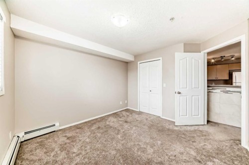 1220-10 Prestwick Bay Se, Calgary, AB - Indoor Photo Showing Other Room