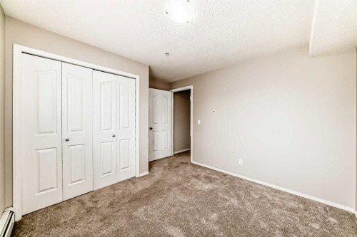 1220-10 Prestwick Bay Se, Calgary, AB - Indoor Photo Showing Other Room
