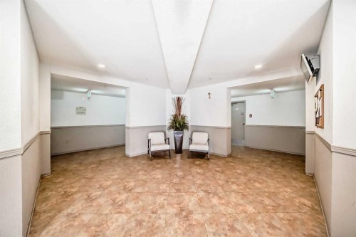 1220-10 Prestwick Bay Se, Calgary, AB - Indoor Photo Showing Other Room