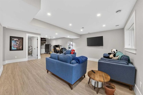 7136 Bow Crescent Nw, Calgary, AB - Indoor With Fireplace