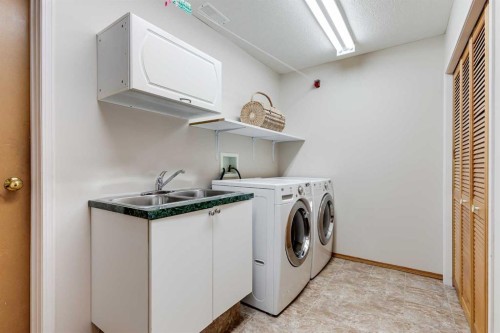 8 Mt Cascade Close Se, Calgary, AB - Indoor Photo Showing Laundry Room
