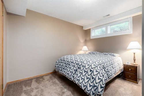 8 Mt Cascade Close Se, Calgary, AB - Indoor Photo Showing Bedroom