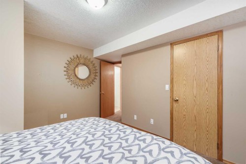 8 Mt Cascade Close Se, Calgary, AB - Indoor Photo Showing Bedroom