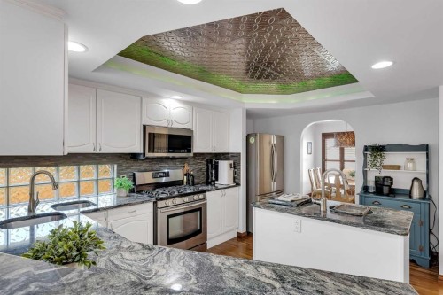 8 Mt Cascade Close Se, Calgary, AB - Indoor Photo Showing Kitchen With Stainless Steel Kitchen
