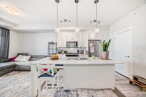 415-300 Auburn Meadows Common Se, Calgary, AB - Indoor Photo Showing Kitchen With Stainless Steel Kitchen With Double Sink With Upgraded Kitchen