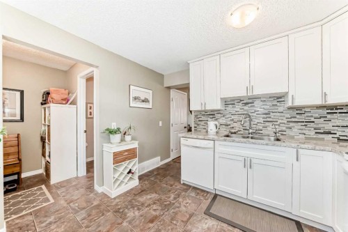 48 Millcrest Way Sw, Calgary, AB - Indoor Photo Showing Kitchen