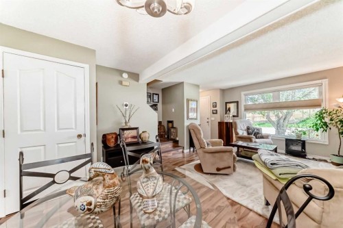 48 Millcrest Way Sw, Calgary, AB - Indoor Photo Showing Living Room