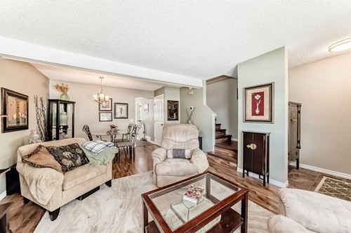 48 Millcrest Way Sw, Calgary, AB - Indoor Photo Showing Living Room