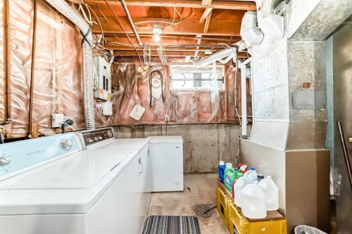 48 Millcrest Way Sw, Calgary, AB - Indoor Photo Showing Laundry Room
