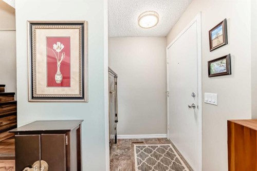 48 Millcrest Way Sw, Calgary, AB - Indoor Photo Showing Other Room