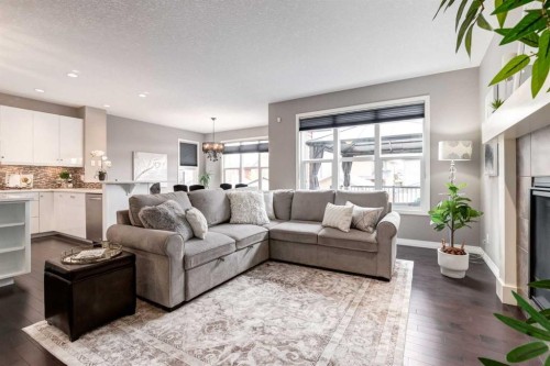 33 Evansglen Drive Nw, Calgary, AB - Indoor Photo Showing Living Room With Fireplace