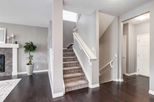 33 Evansglen Drive Nw, Calgary, AB - Indoor With Fireplace