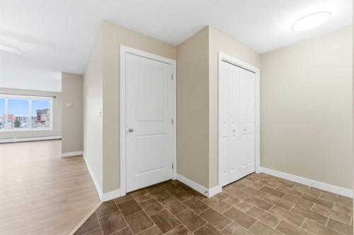 2302-625 Glenbow Drive, Cochrane, AB - Indoor Photo Showing Other Room