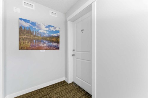 2302-625 Glenbow Drive, Cochrane, AB - Indoor Photo Showing Other Room