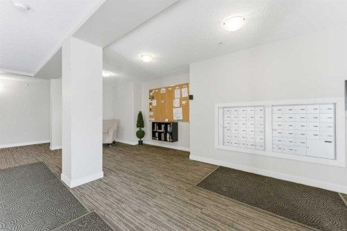 2302-625 Glenbow Drive, Cochrane, AB - Indoor Photo Showing Other Room