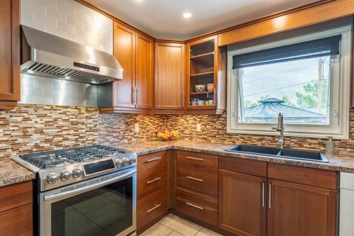 248 Templevale Road Ne, Calgary, AB - Indoor Photo Showing Kitchen With Double Sink With Upgraded Kitchen