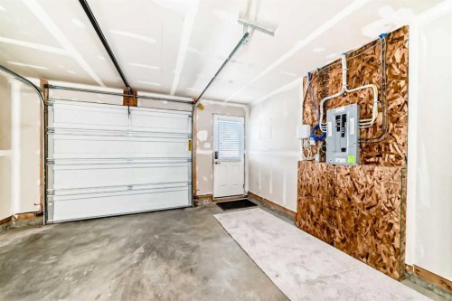 336 South Point Square Sw, Airdrie, AB - Indoor Photo Showing Garage