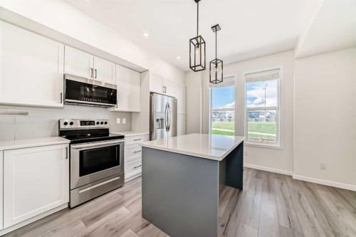 336 South Point Square Sw, Airdrie, AB - Indoor Photo Showing Kitchen With Upgraded Kitchen