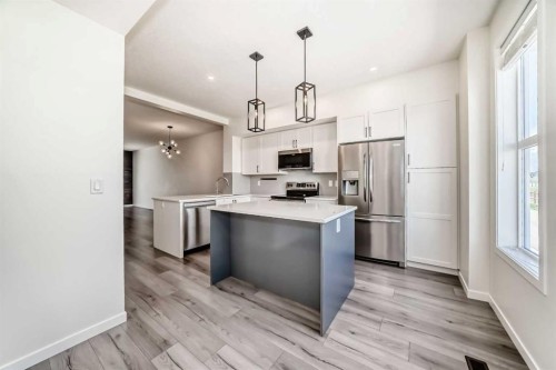 336 South Point Square Sw, Airdrie, AB - Indoor Photo Showing Kitchen With Upgraded Kitchen
