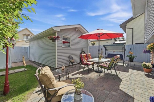 672 Macewan Drive Nw, Calgary, AB - Outdoor With Deck Patio Veranda With Exterior
