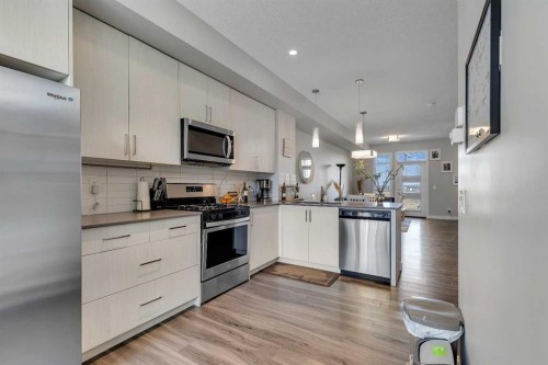 154 Seton Passage Se, Calgary, AB - Indoor Photo Showing Kitchen With Stainless Steel Kitchen With Upgraded Kitchen