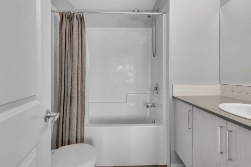 154 Seton Passage Se, Calgary, AB - Indoor Photo Showing Bathroom