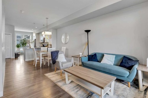 154 Seton Passage Se, Calgary, AB - Indoor Photo Showing Living Room