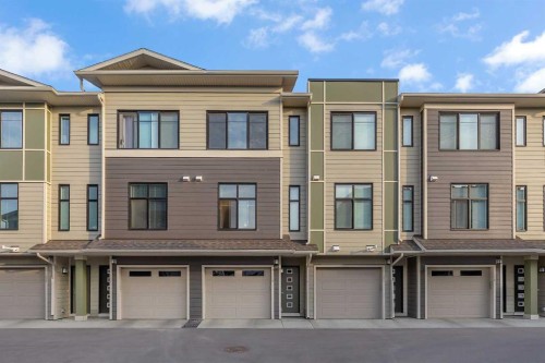 154 Seton Passage Se, Calgary, AB - Outdoor With Facade