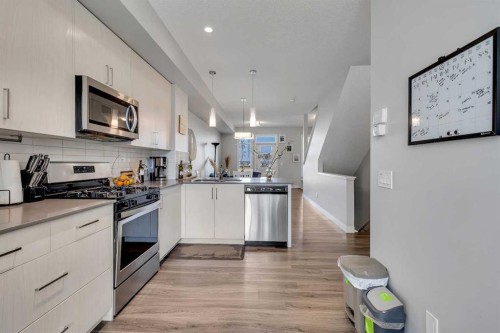 154 Seton Passage Se, Calgary, AB - Indoor Photo Showing Kitchen With Stainless Steel Kitchen With Upgraded Kitchen