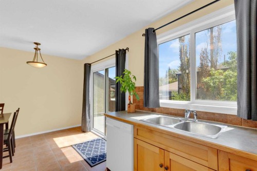 403 Cannington Close Sw, Calgary, AB - Indoor Photo Showing Kitchen With Double Sink