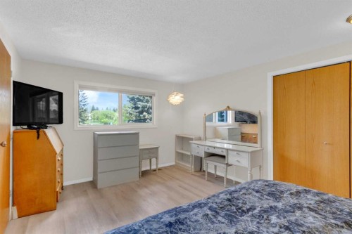 403 Cannington Close Sw, Calgary, AB - Indoor Photo Showing Bedroom