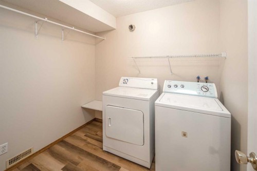 149 Sceptre Court Nw, Calgary, AB - Indoor Photo Showing Laundry Room