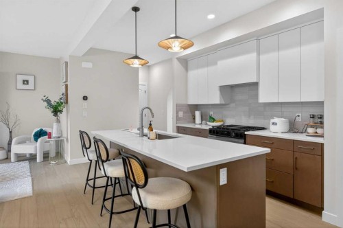 267 Bluerock Avenue Sw, Calgary, AB - Indoor Photo Showing Kitchen With Upgraded Kitchen