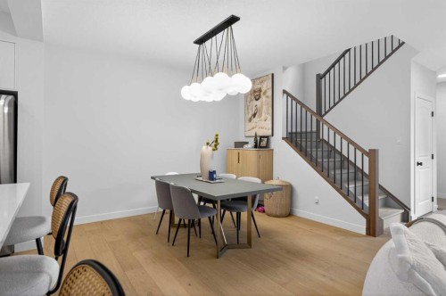 267 Bluerock Avenue Sw, Calgary, AB - Indoor Photo Showing Dining Room