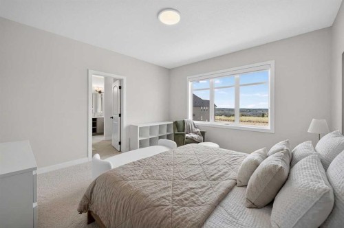 267 Bluerock Avenue Sw, Calgary, AB - Indoor Photo Showing Bedroom