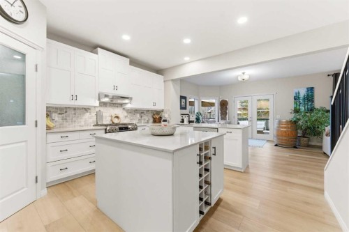 74 Evercreek Bluffs Road Sw, Calgary, AB - Indoor Photo Showing Kitchen With Upgraded Kitchen