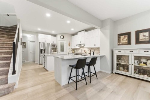 74 Evercreek Bluffs Road Sw, Calgary, AB - Indoor Photo Showing Kitchen With Upgraded Kitchen