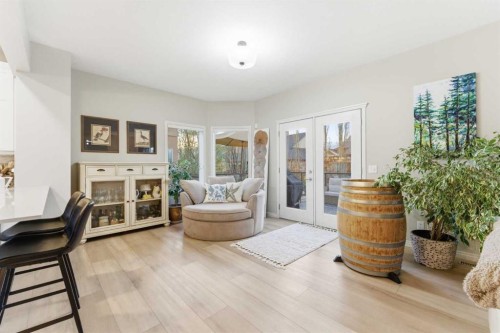 74 Evercreek Bluffs Road Sw, Calgary, AB - Indoor Photo Showing Living Room