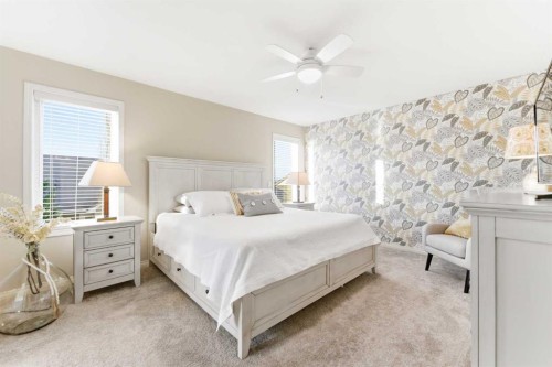 74 Evercreek Bluffs Road Sw, Calgary, AB - Indoor Photo Showing Bedroom