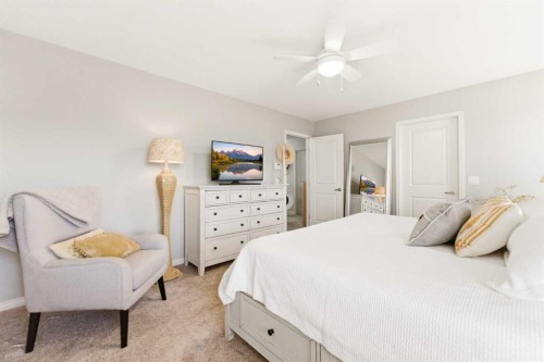 74 Evercreek Bluffs Road Sw, Calgary, AB - Indoor Photo Showing Bedroom
