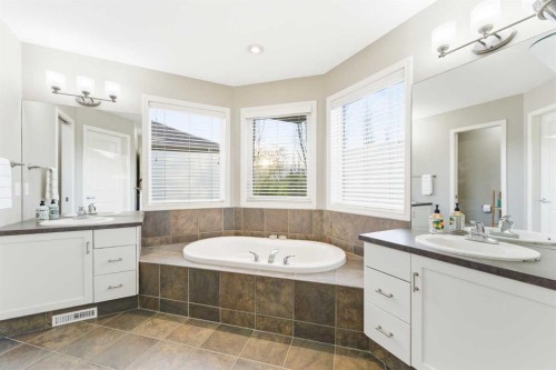 74 Evercreek Bluffs Road Sw, Calgary, AB - Indoor Photo Showing Bathroom