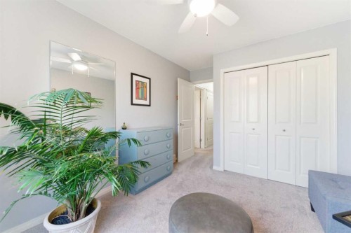 74 Evercreek Bluffs Road Sw, Calgary, AB - Indoor Photo Showing Bedroom