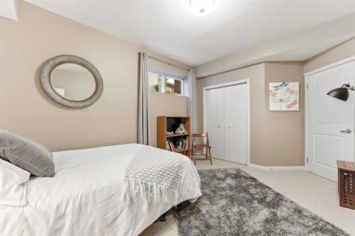 74 Evercreek Bluffs Road Sw, Calgary, AB - Indoor Photo Showing Bedroom