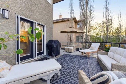 74 Evercreek Bluffs Road Sw, Calgary, AB - Outdoor With Deck Patio Veranda With Exterior