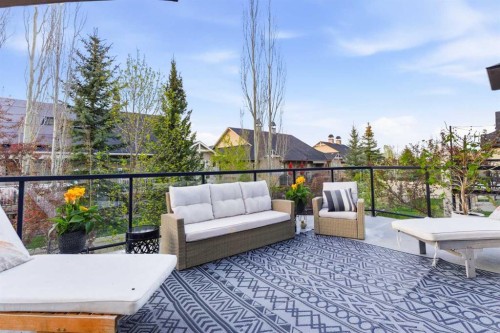 74 Evercreek Bluffs Road Sw, Calgary, AB - Outdoor With Deck Patio Veranda