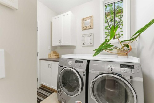 74 Evercreek Bluffs Road Sw, Calgary, AB - Indoor Photo Showing Laundry Room