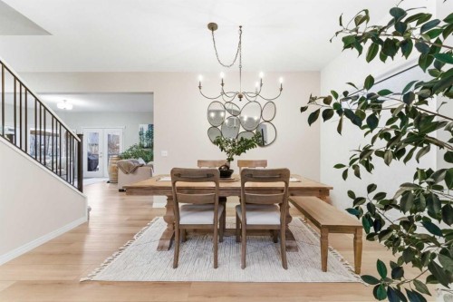 74 Evercreek Bluffs Road Sw, Calgary, AB - Indoor Photo Showing Dining Room