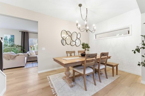74 Evercreek Bluffs Road Sw, Calgary, AB - Indoor Photo Showing Dining Room