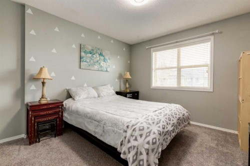 126 Harvest Gold Place Ne, Calgary, AB - Indoor Photo Showing Bedroom